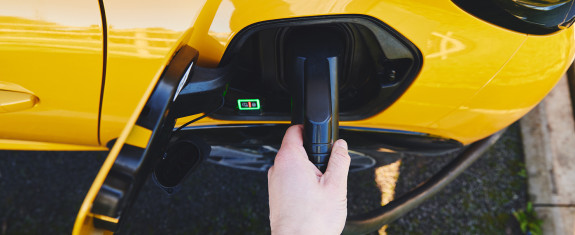 pov of man plugging in electric car 2022 05 01 23 53 48 utc